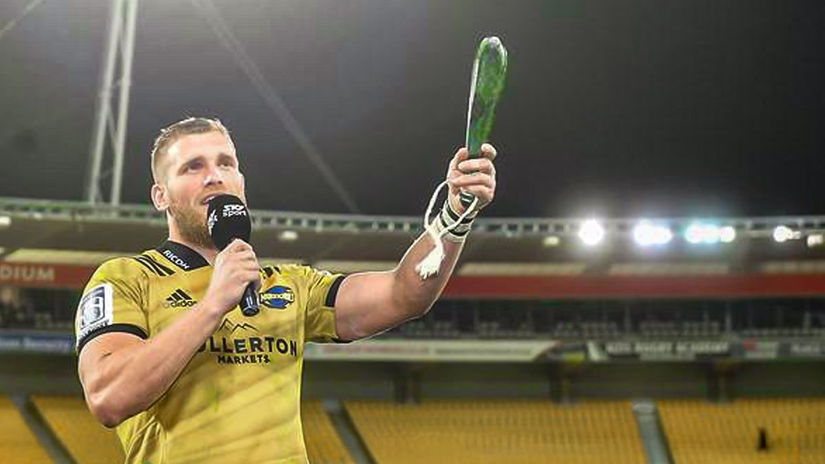 Brad Shields presented with a pounamu mere for his 100th Super Rugby game