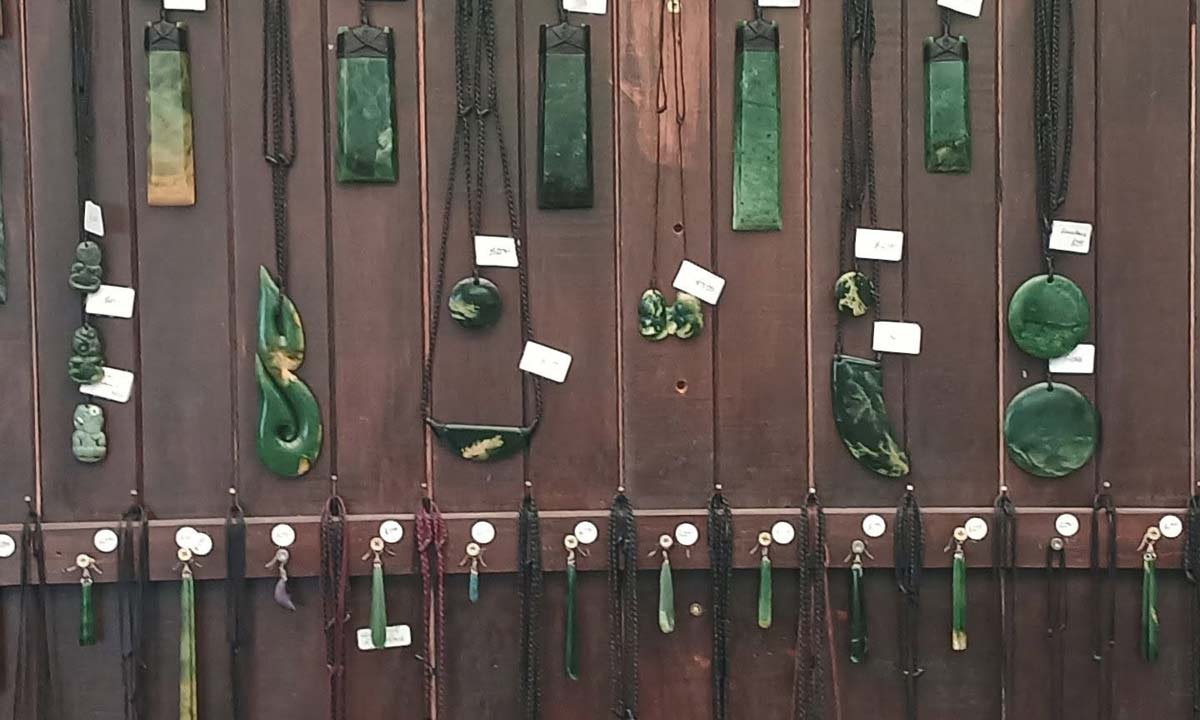 Hawkes bay pounamu wood and jade necklaces on board