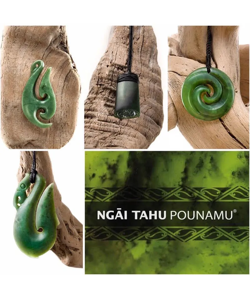 Ngāi Tahu Pounamu branded image of hei matau, toki and koru disc pendants displayed on driftwood